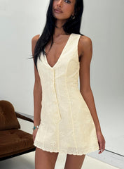 Sylvara Textured Button Up Romper Yellow