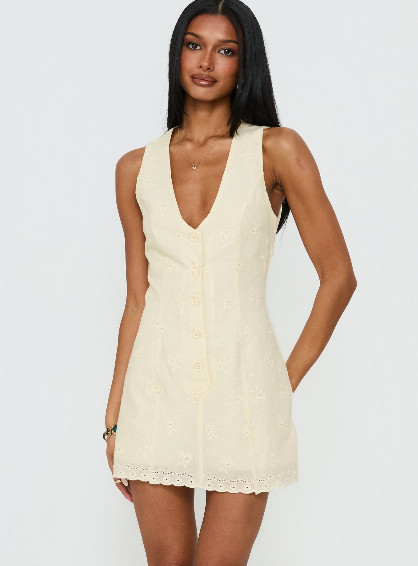 Sylvara Textured Button Up Romper Yellow