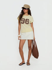 96 Charm Studded Graphic Baby Tee Yellow