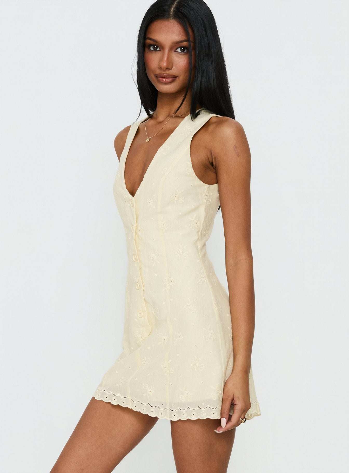 Sylvara Textured Button Up Romper Yellow