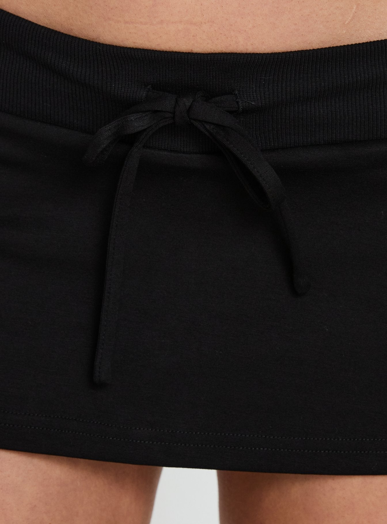 Dynah Tie Waist Tipping Mini Skort Black